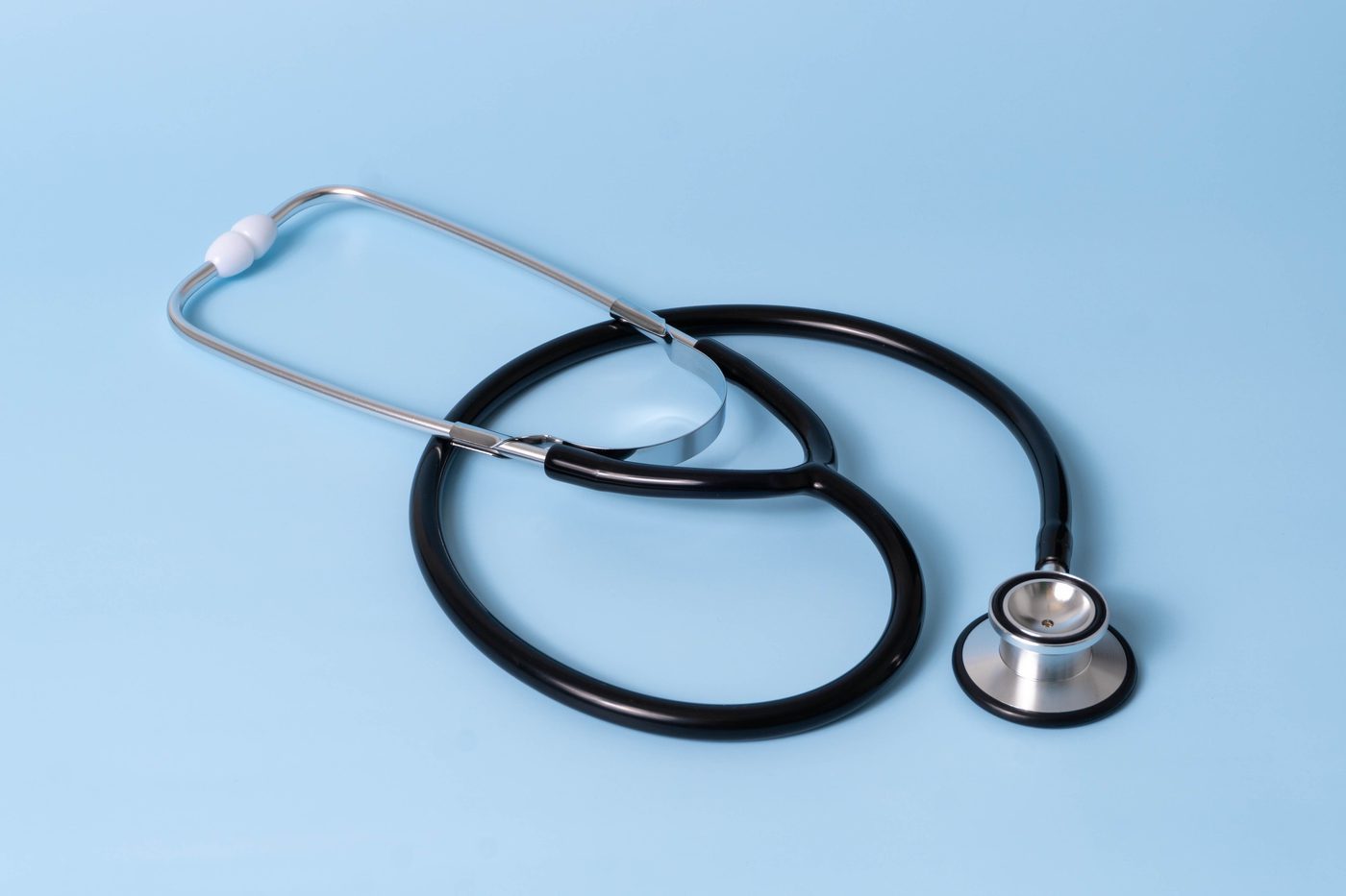 Stethoscope on a light blue background